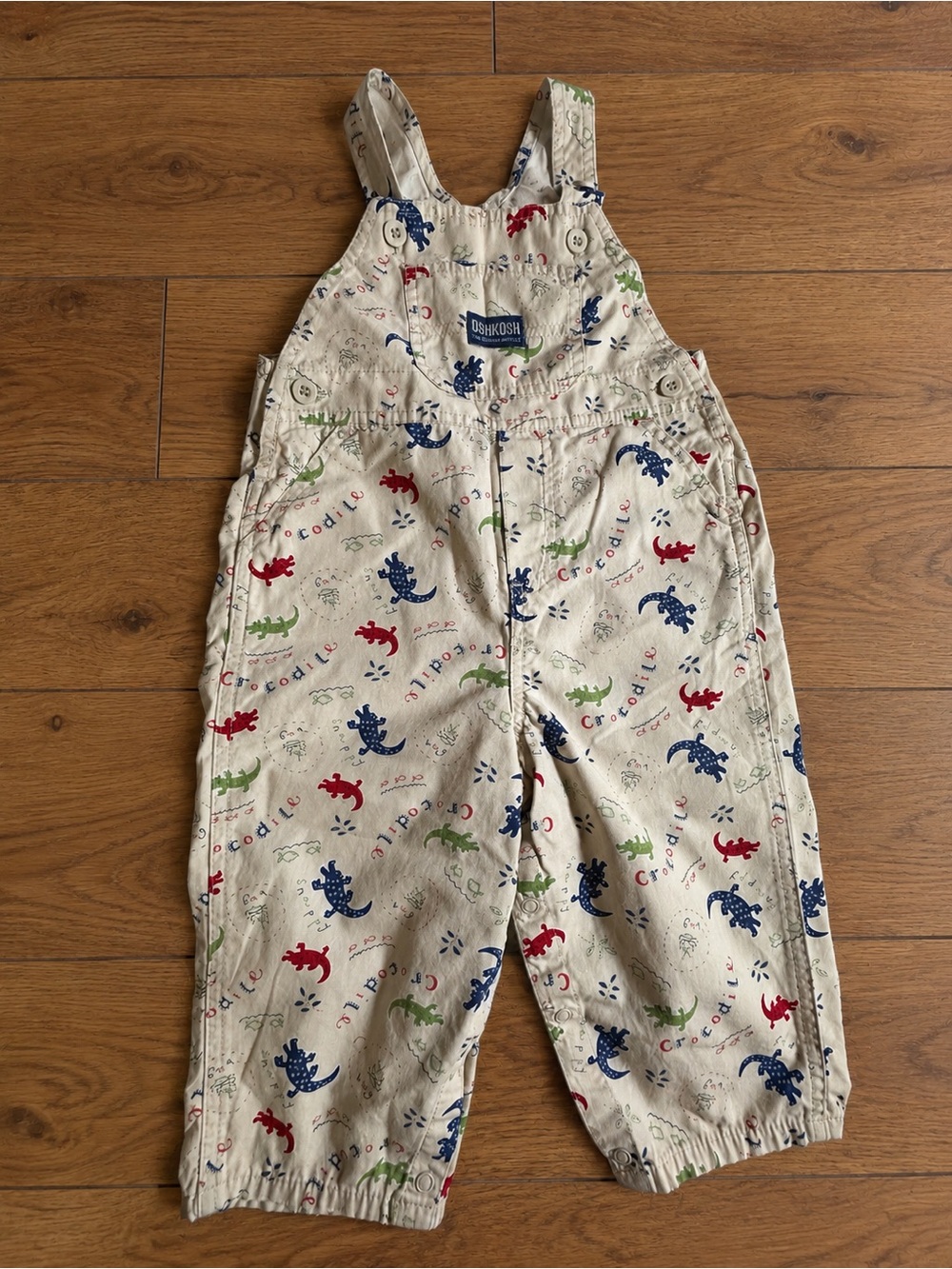 OshKosh B'gosh Cream Overalls with Red, Blue & Green Crocodile Print